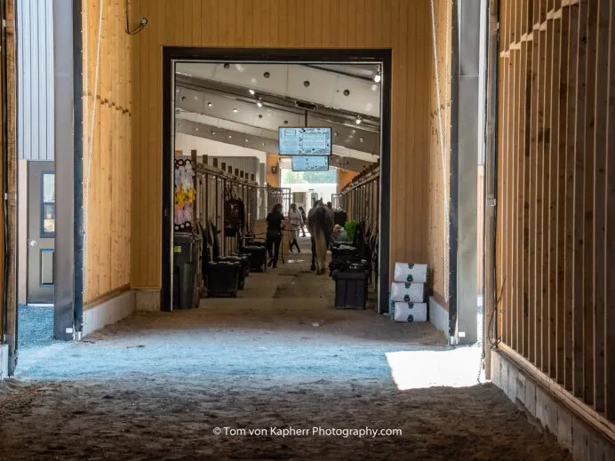 corridor-from-the-indoor-warm-up-arena-to-the-4-season-stable-scaled